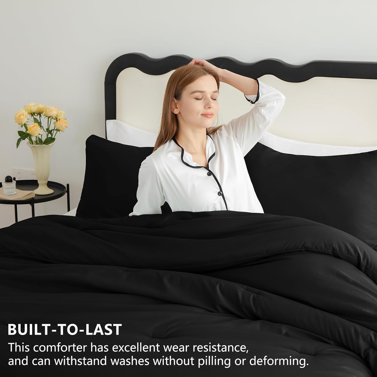 Black Queen-size 3-piece quilted bedding set.