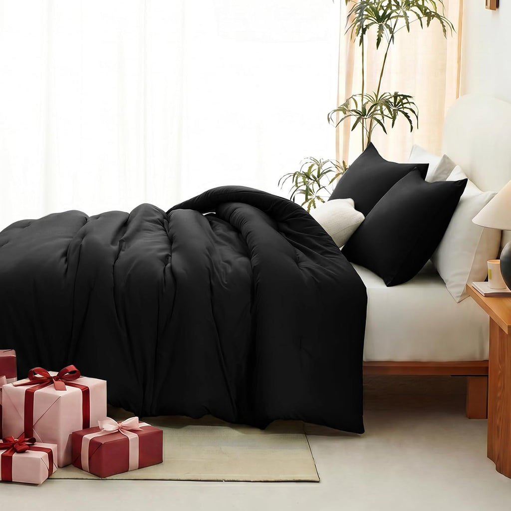 Black Queen-size 3-piece quilted bedding set.