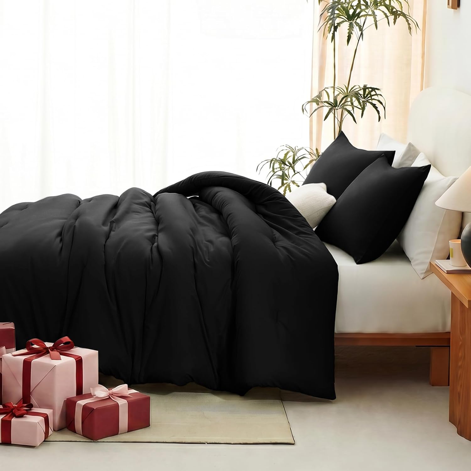 Black Queen-size 3-piece quilted bedding set.