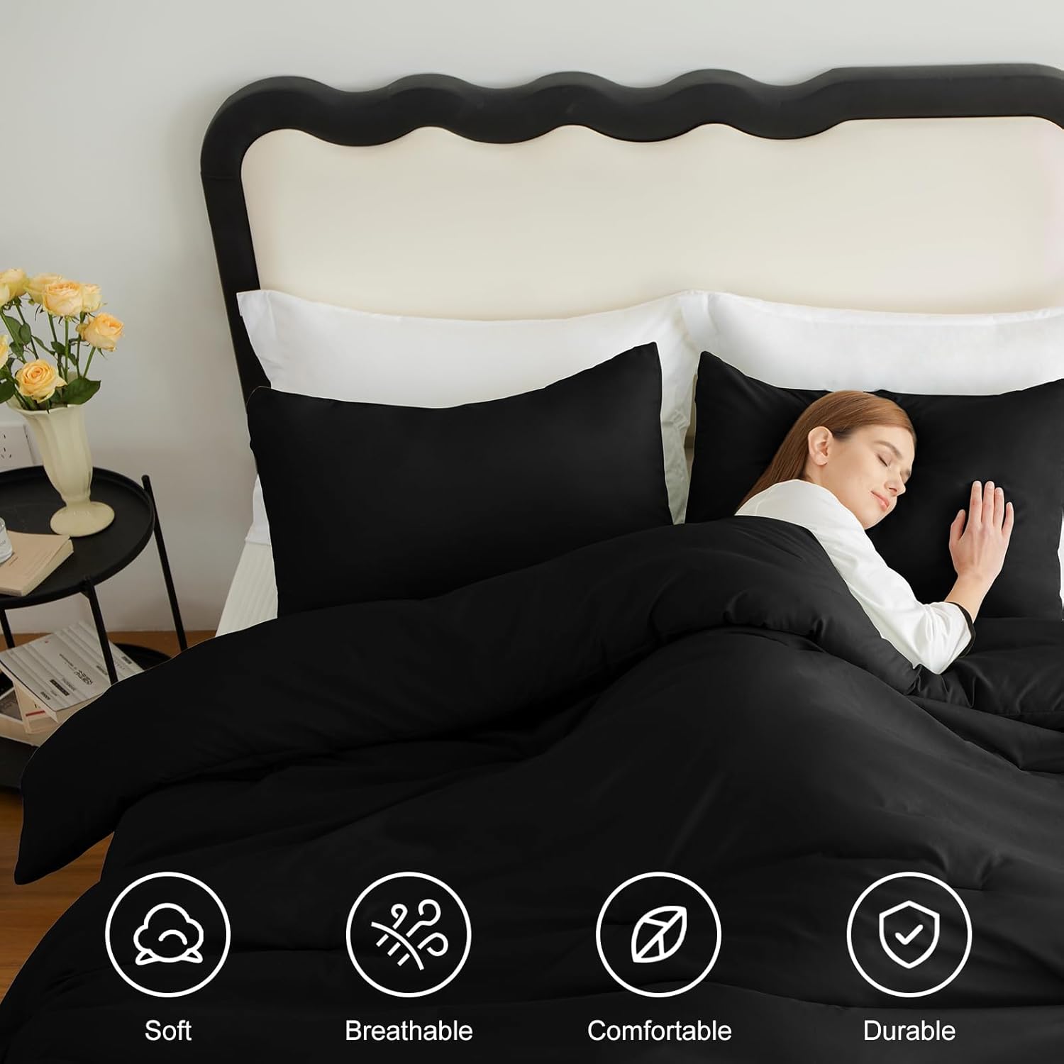 Black Queen-size 3-piece quilted bedding set.