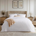 Quilt – Lightweight summer-style Queen-size quilt.